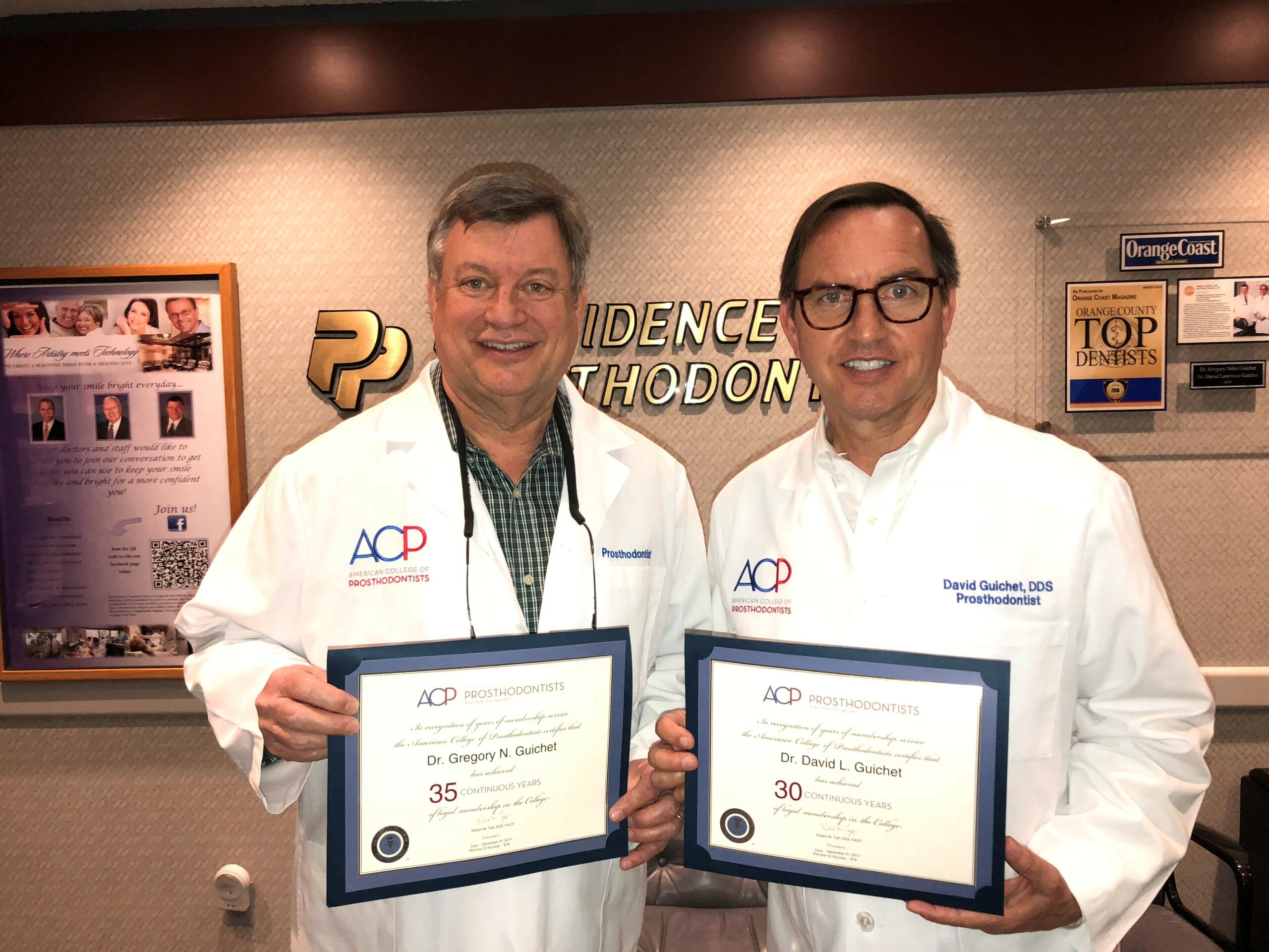 65 years of service in Prosthodontics in Orange, CA | Doctors posing with awards